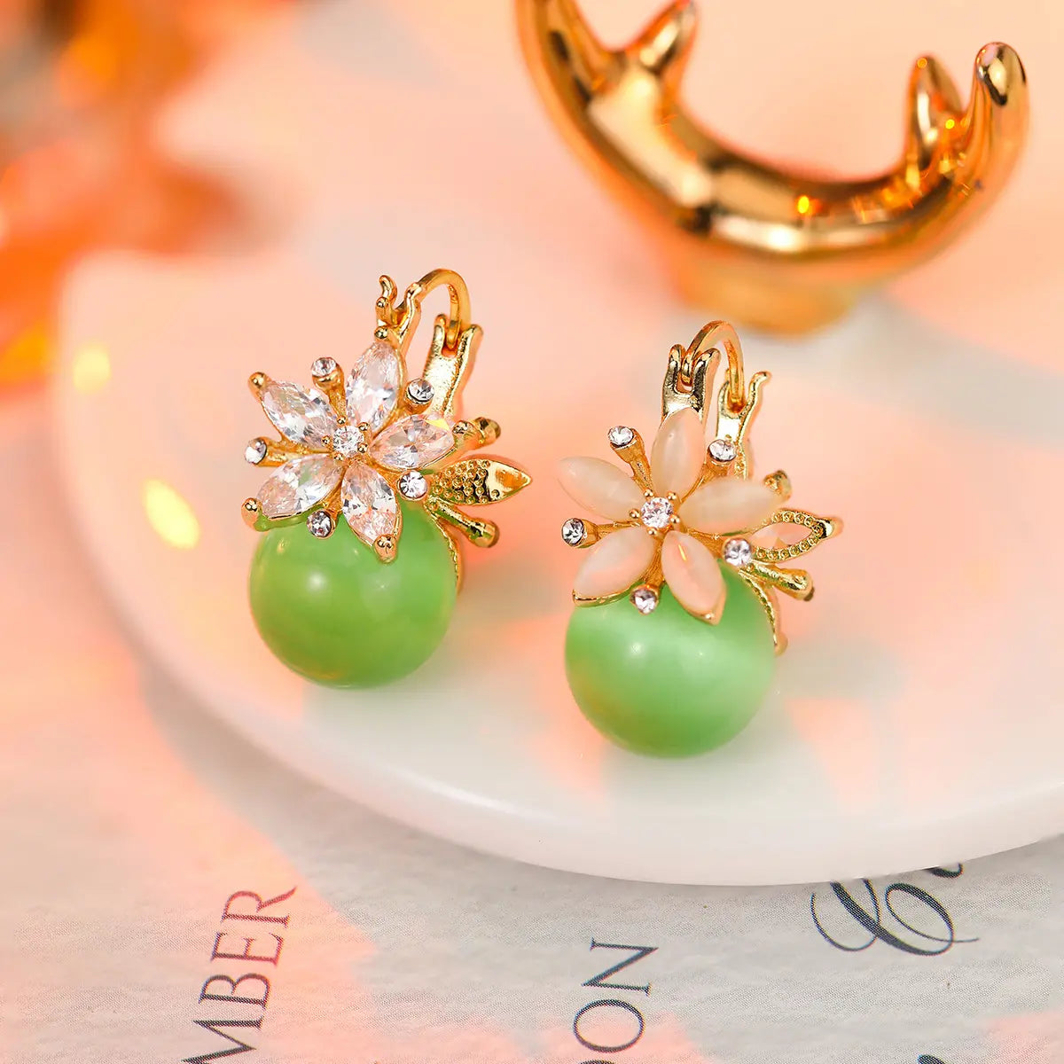 Niche design double-sided zircon flower cat's eye stone earrings