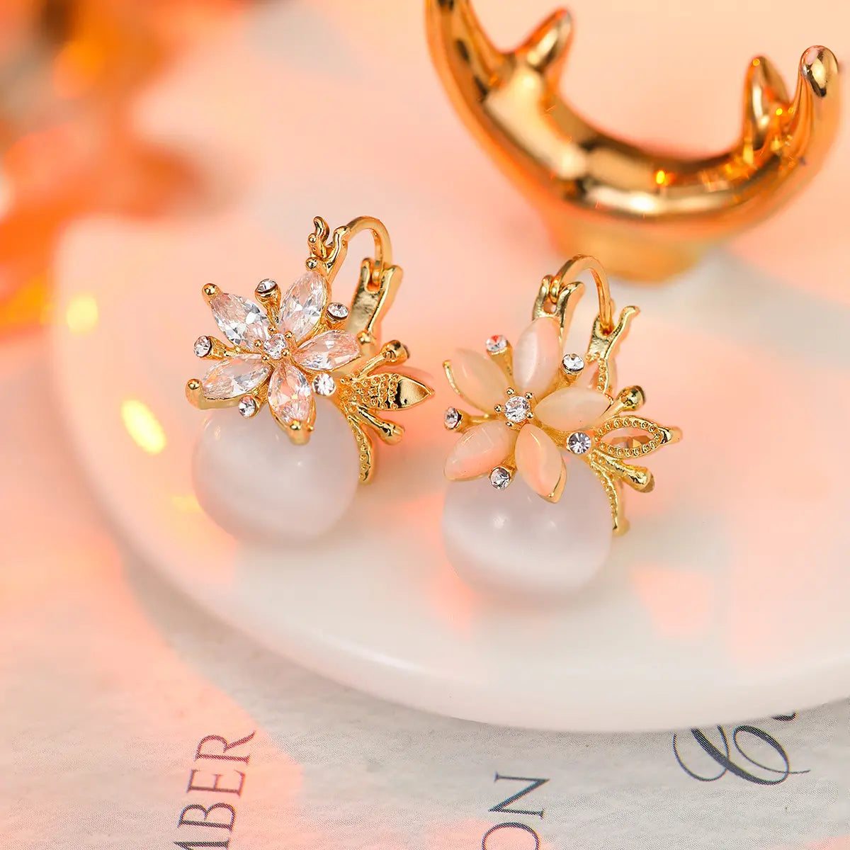 Niche design double-sided zircon flower cat's eye stone earrings